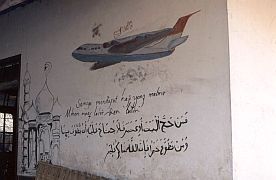 Gili Re: Bemalte Hauswand eines Hajis